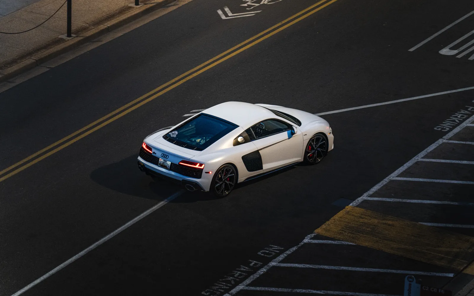 White Audi R8 on the street from above/bird's eye view