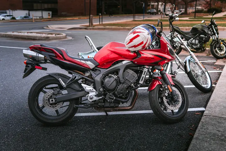 Red Yamaha FZ6 in a parking lot